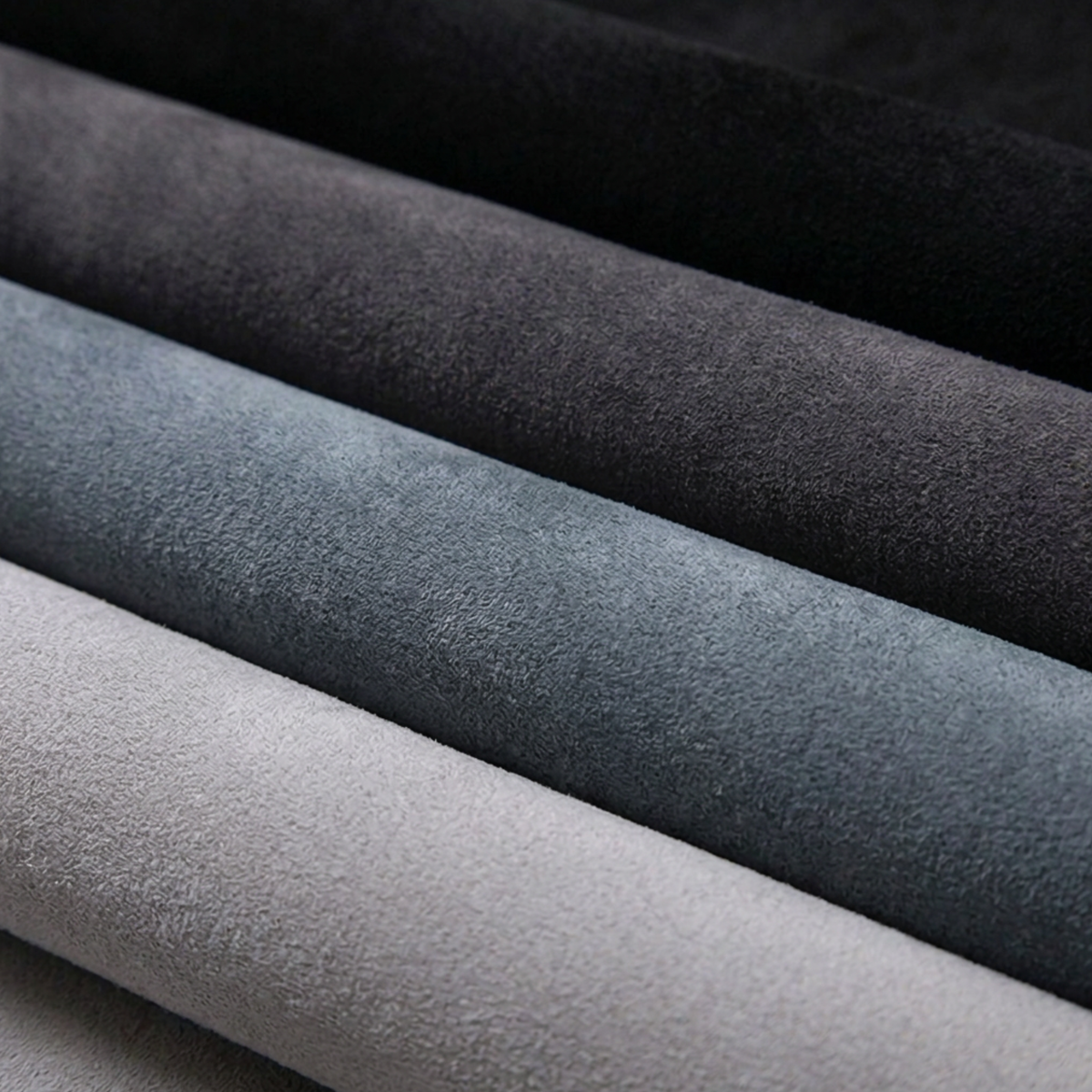 Flexible suede lining fabric in black, grey and blue tones